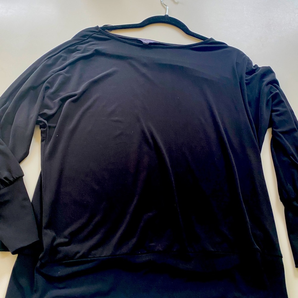 Worn very little. The Limited Dolman Sleeve pull over top with banded waist.